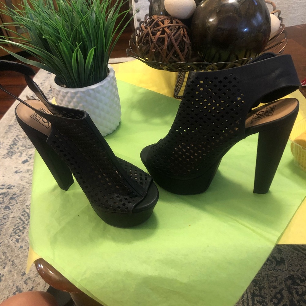 Heeled leather caged peep toe sandals
